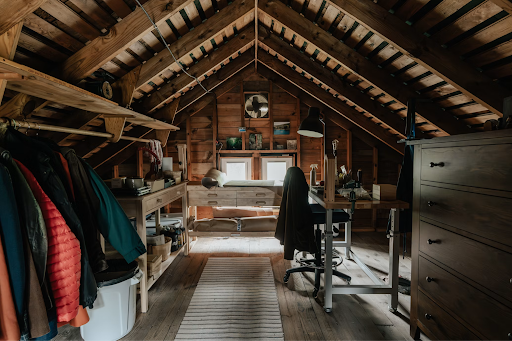 An attic space used for storage and a craft area.